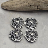 These beautiful 2 Hole Slider Beads feature a classic heart motif framed by detailed concho-inspired metalwork in an antique silver finish. Their versatile design works wonderfully in Western, bohemian, vintage-inspired, and rustic jewelry projects. Ideal for bracelets, necklaces, earrings, and multi-strand jewelry, these focal beads provide meaningful symbolism while adding decorative detail and professional craftsmanship to handmade jewelry creations.
