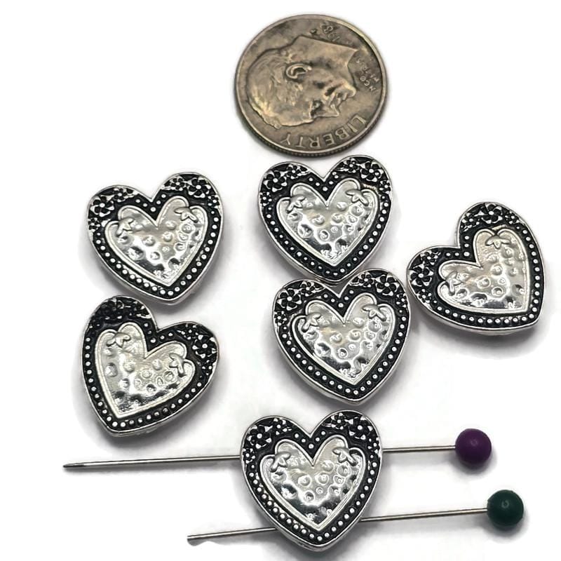 Add timeless elegance to your jewelry designs with these Heart Faux Pearl 2 Hole Slider Beads. Featuring a luminous white faux pearl center framed by an ornate antique silver heart setting, these focal beads are perfect for bracelet making, necklace designs, earrings, pendants, and multi-strand jewelry. Their dual-hole construction provides excellent stability while adding romantic charm to handmade jewelry, bridal accessories, and meaningful gift creations.