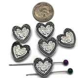 Add timeless elegance to your jewelry designs with these Heart Faux Pearl 2 Hole Slider Beads. Featuring a luminous white faux pearl center framed by an ornate antique silver heart setting, these focal beads are perfect for bracelet making, necklace designs, earrings, pendants, and multi-strand jewelry. Their dual-hole construction provides excellent stability while adding romantic charm to handmade jewelry, bridal accessories, and meaningful gift creations.