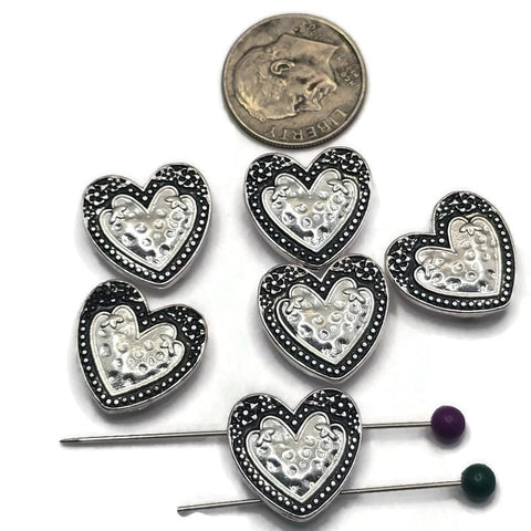 Add timeless elegance to your jewelry designs with these Heart Faux Pearl 2 Hole Slider Beads. Featuring a luminous white faux pearl center framed by an ornate antique silver heart setting, these focal beads are perfect for bracelet making, necklace designs, earrings, pendants, and multi-strand jewelry. Their dual-hole construction provides excellent stability while adding romantic charm to handmade jewelry, bridal accessories, and meaningful gift creations.