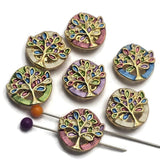 Celebrate growth, hope, and family with these colorful Tree of Life Slider Beads. The bright gold finish highlights vibrant enamel detailing in soft pastel shades, creating beautiful focal beads for bracelets, necklaces, earrings, and decorative pendants. These 2 Hole Slider Beads work wonderfully with leather cord, pearls, crystals, natural stones, and seed beads for unique handmade jewelry designs.