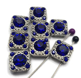 These beautiful Sapphire Blue Slider Beads feature a vibrant faceted center stone accented by smaller sparkling rhinestones and decorative antique silver detailing. Designed with two holes for stringing, they work beautifully in bracelets, necklaces, leather jewelry, bead weaving, and custom jewelry projects. Their rich blue color creates eye-catching focal points while adding elegance and dimension to your favorite handmade jewelry designs and jewelry making supplies collection.