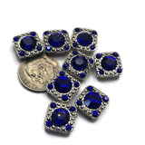 Designed for versatility and beauty, these Sapphire Blue Rhinestone Slider Beads feature a large faceted center stone accented by smaller coordinating rhinestones. Their antique silver finish complements both contemporary and vintage-inspired jewelry styles. Perfect for bracelets, necklaces, earrings, pendants, bead weaving, Peyote Stitch, and loom work, these decorative focal beads are valuable additions to your jewelry findings and jewelry making supplies inventory.