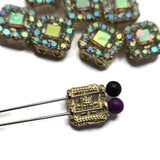 Featuring sparkling Clear AB rhinestones and bright gold metal, these 2 Hole Slider Beads bring elegance and color-shifting brilliance to handmade jewelry. Their square design and dual-hole construction make them perfect for bracelet making, necklace designs, multi-strand jewelry, and artisan jewelry projects. Use them with seed beads, pearls, and other jewelry findings to create custom accessories that showcase beautiful sparkle and professional-looking results.