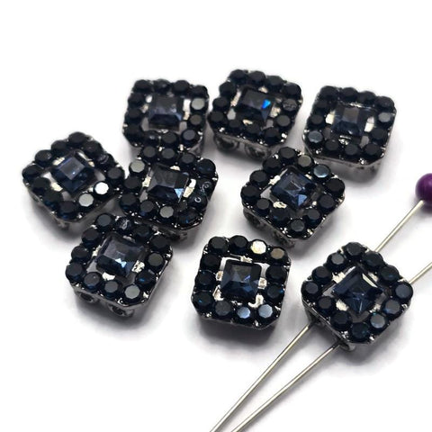 Add dramatic elegance to your jewelry designs with these Jet CZ Rhinestone 2 Hole Slider Beads. Featuring deep black rhinestones set in a gun metal finish, these focal beads are perfect for bracelet making, necklace designs, earrings, pendants, and multi-strand jewelry. Their dual-hole construction makes them ideal for bead weaving, Peyote Stitch, loom work, and artisan jewelry projects while providing striking contrast and sophisticated style.