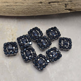 Create striking handmade jewelry with these Jet CZ 2 Hole Slider Beads. The faceted center rhinestone and coordinating accent stones reflect subtle flashes of light while maintaining a rich black appearance. Their gun metal finish enhances the dramatic styling, making them ideal focal beads for bracelet making, necklace designs, artisan jewelry, bead weaving, and multi-strand jewelry projects.