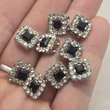 These beautiful Rhinestone Slider Beads feature a bold Jet CZ center stone framed by brilliant Clear CZ rhinestones in a bright platinum silver setting. The striking black and clear color combination creates sophisticated focal points for bracelets, necklaces, earrings, and pendants. Their two-hole design provides stability and versatility for multi-strand jewelry, bead weaving, artisan jewelry, and custom handmade jewelry projects requiring elegant decorative accents.
