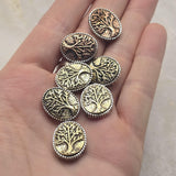 Create nature-inspired handmade jewelry with these Tree of Life 2 Hole Slider Beads. The symbolic tree design represents balance, renewal, and personal growth while the antique brass and antique copper finishes add rustic charm. Perfect for bracelet making, necklace designs, leather jewelry, pendants, and artisan accessories, these focal beads provide both decorative beauty and meaningful symbolism within finished jewelry designs.