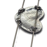 Create romantic handmade jewelry with these Heart Faux Pearl 2 Hole Slider Beads. The elegant white faux pearl center contrasts beautifully with the detailed antique silver finish, creating eye-catching focal beads for bracelets, necklaces, earrings, and pendants. Perfect for bridal jewelry, anniversary gifts, Valentine's Day creations, and everyday accessories, these versatile slider beads also work beautifully in bead weaving, Peyote Stitch, and custom artisan jewelry designs.