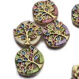 These bright gold Tree of Life Slider Beads feature colorful enamel detailing that beautifully highlights every branch and leaf. Their round shape and dual-hole construction make them ideal focal beads for bracelets, necklaces, pendants, earrings, and multi-strand jewelry. Pair them with crystals, pearls, leather, or natural gemstones to create handmade jewelry filled with color, symbolism, and artisan style.