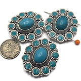 These Western 2 Hole Slider Beads feature a classic silver concho design accented with vibrant faux turquoise cabochons for an authentic Southwest look. Their dual-hole construction keeps strands aligned while creating professional-looking bracelets and necklaces. Ideal for jewelry makers who love Western, country, ranch, and bohemian styles, these decorative focal beads pair beautifully with leather, crystals, seed beads, and natural gemstones.