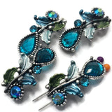 These elegant Floral 2 Hole Slider Beads combine sparkling blue rhinestones, enamel leaves, and antique silver metalwork into beautiful focal beads for jewelry making. Ideal for multi-strand bracelets, necklaces, and bead weaving projects, these decorative metal beads complement coastal, botanical, cottagecore, vintage-inspired, and bohemian jewelry styles while adding color, texture, and brilliant sparkle to every design.