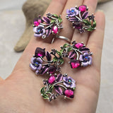 These antique silver Floral 2 Hole Slider Beads are beautifully decorated with faceted crystals, colorful enamel accents, and graceful floral details. Designed as decorative metal focal beads, they are ideal for bracelets, necklaces, and artisan jewelry projects. Their elegant botanical style coordinates beautifully with crystals, seed beads, natural stones, and other jewelry making supplies.