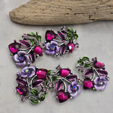 Add floral elegance to your jewelry designs with these decorative 2 Hole Slider Beads. Featuring hand-painted enamel details, sparkling crystal accents, and an antique silver finish, these metal focal beads are ideal for bracelets, necklaces, earrings, and mixed-media jewelry. Their two-hole design keeps strands aligned while creating beautiful botanical jewelry inspired by flowers and nature.