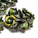 Design unique handmade jewelry with these Floral 2 Hole Slider Beads featuring sparkling rhinestones, enamel flowers, and beautifully detailed metal leaves. These decorative focal beads are ideal for bracelets, necklaces, and bead weaving projects, adding botanical charm to every design. Pair them with crystals, gemstones, seed beads, and other jewelry making supplies for endless creative possibilities.