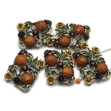 These antique gold Floral 2 Hole Slider Beads combine detailed flowers, graceful leaves, and sparkling faceted stones into decorative metal focal beads perfect for jewelry making. Ideal for multi-strand bracelets, necklaces, and artisan jewelry, they pair beautifully with Czech glass, natural stone beads, crystals, pearls, and leather for elegant botanical creations with lasting appeal.