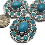 Add bold Southwestern style to your handmade jewelry with these Silver Turquoise 2 Hole Slider Beads. The detailed silver setting and multiple faux turquoise stones create an eye-catching focal that's perfect for bracelets, necklaces, and artisan jewelry designs. Designed for multi-strand projects, these decorative slider beads complement leather, turquoise beads, jasper, and other jewelry making supplies for classic Western-inspired creations.