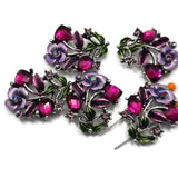 Create elegant handmade jewelry with these Floral 2 Hole Slider Beads featuring sparkling faceted crystals, hand-painted enamel flowers and leaves, and an antique silver finish. These decorative metal beads make beautiful focal beads for bracelets, necklaces, and multi-strand jewelry. Pair them with pearls, seed beads, natural stone beads, or leather to create botanical jewelry with timeless charm and professional-looking results.