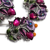 Bring the beauty of a blooming garden to your handmade jewelry with these Floral 2 Hole Slider Beads. Featuring sparkling rhinestones, detailed enamel flowers, and an antique silver finish, these decorative metal beads create eye-catching focal points for bracelets, necklaces, and multi-strand designs. Perfect for botanical, romantic, cottagecore, and vintage-inspired jewelry collections.