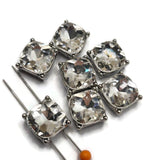 Make the focal bead the star of your jewelry design with these Clear Rhinestone 2 Hole Slider Beads. Large faceted glass crystals provide brilliant sparkle while platinum silver metal settings create a clean, versatile finish. These metal beads are perfect focal beads for bracelets, necklaces, bead weaving, and multi-strand jewelry and coordinate easily with pearls, Czech glass, gemstones, seed beads, and other jewelry making supplies.