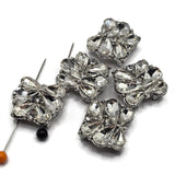 These clear rhinestone 2 hole slider beads add brilliant sparkle and dimension to handmade jewelry designs. Featuring large faceted teardrop crystals arranged in a floral-inspired pattern with smaller clear rhinestone accents, each bead has an elegant platinum silver or stainless steel-tone setting. these crystal focal beads are perfect for bracelets, bead weaving, necklaces, bridal jewelry, wedding accessories, and DIY jewelry making. Each package contains 5 beautiful slider beads.