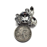 Sparkling rhinestone focal beads in platinum silver tone metal featuring a combination of clear round and marquise faceted crystals. These decorative 2 hole slider beads bring texture, dimension, and brilliant sparkle to handmade bracelets, necklaces, bead weaving, seed bead jewelry, and multi-strand designs. Their glamorous crystal appearance makes them especially beautiful for bridal jewelry, wedding accessories, formal pieces, holiday jewelry, and elegant DIY jewelry making projects.