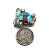 Platinum silver 2 hole slider beads covered with brilliant Clear AB rhinestones in round and marquise shapes. The faceted Aurora Borealis crystals reflect a constantly changing rainbow of colors, giving these focal beads incredible dimension and sparkle. Use them for DIY bracelets, necklaces, bead weaving, multi-strand jewelry, seed bead projects, bridal designs, and glamorous handmade accessories. These crystal beads coordinate beautifully with nearly any jewelry color palette.