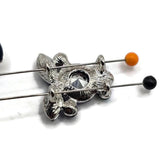 Deep Montana Blue crystal 2 hole slider beads accented with sparkling Clear AB rhinestones in a bright platinum silver metal tone. Large round and marquise faceted stones create dramatic dimension while smaller rhinestones add brilliant light reflection. These decorative focal beads are ideal for bracelet making, double strand jewelry, bead weaving, seed bead designs, necklaces, and DIY jewelry projects using silver findings, pearls, crystals, or gemstones.