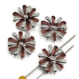 Purple enamel floral 2 hole slider beads featuring alternating polished bright silver and rich purple petals in a dimensional flower design. These 17 mm round focal beads have approximately 5 mm spacing between the holes for double-strand bracelets, bead weaving, necklaces, cuffs, and handmade jewelry. Bright silver plated metal adds reflective shine while the purple enamel creates beautiful color for botanical and floral jewelry-making projects.