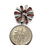 Bright silver and purple flower 2 hole slider beads with dimensional alternating petals and a polished silver center. Measuring approximately 17 mm in diameter with 5 mm between the holes, these floral focal beads are ideal for bracelet making, bead weaving, multi-strand jewelry, necklaces, and cuffs. Rich purple enamel contrasts beautifully with reflective silver metal for colorful garden-inspired, botanical, feminine, and handmade jewelry designs.