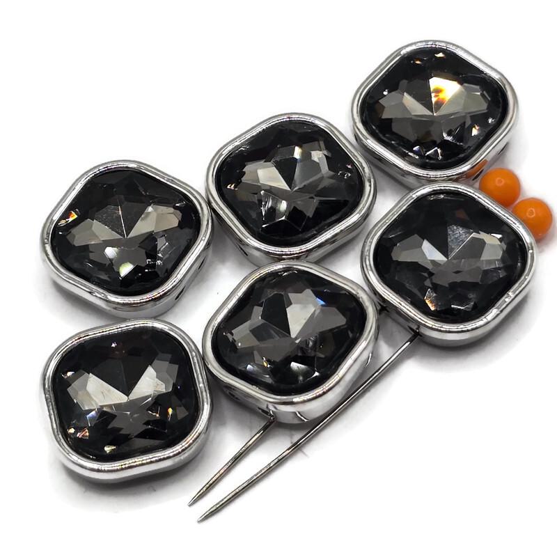 Black Diamond rhinestone 2 hole slider beads in a sleek platinum silver finish that coordinates beautifully with stainless-steel-colored jewelry components. Each square focal bead features a large faceted smoky gray glass rhinestone that reflects shades of charcoal, silver, and black. Two stringing holes on each side make these beads ideal for double-strand bracelets, bead weaving, necklaces, handmade jewelry designs, DIY bracelet making, and creative jewelry making at home.