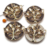 Elegant dark gray and light gray Tree of Life jewelry making beads featuring polished gold branches and decorative enamel leaves in smoky charcoal, taupe gray, and ivory shades. These beautiful round 2 Hole Slider Beads feature textured circular borders in contrasting charcoal and pearly ivory finishes. Ideal jewelry findings for bracelet making, necklace designs, inspirational jewelry, and handmade accessories. Unique focal beads for creating sophisticated earth-toned jewelry collections.