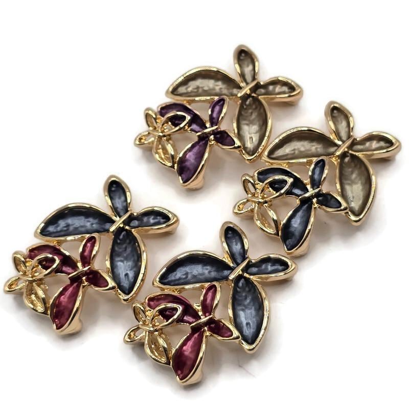 Stunning multicolor Flower Slider Beads featuring an artistic arrangement of overlapping enamel blossoms accented with highly polished bright gold metalwork. The coordinating package includes rich charcoal gray and burgundy flowers alongside smoky champagne, purple, and navy blue color combinations. These dimensional floral jewelry focal beads are ideal for handmade bracelets, beaded necklaces, multi-strand jewelry, and creative bead weaving.