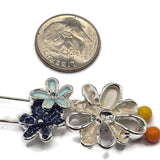Stunning bright silver Flower Slider Beads showcasing dimensional overlapping blossoms in creamy ivory, deep midnight blue, and pale aqua enamel. The decorative floral arrangement combines softly textured enamel petals, polished silver metalwork, and raised metallic flower centers. These unique 2 Hole Slider Beads are ideal for handmade bracelets, necklaces, multi-strand jewelry, and bead weaving.