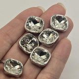 Beautiful assortment of six clear rhinestone 2 Hole Slider Beads in reflective platinum silver settings. Large cushion-cut faceted stones display brilliant crystal-clear sparkle with white and silver reflections.