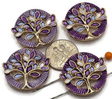 Beautiful gold Tree of Life 2 Hole Slider Beads featuring colorful purple and blue enamel leaves, elegant openwork branches, and textured round borders. These eye-catching jewelry focal beads combine bright reflective gold with soft lavender and white accents for a distinctive decorative appearance. Ideal for handmade jewelry designs, multi-strand bracelets, necklaces, earrings, and bead weaving projects. Unique beading components for creating meaningful, colorful jewelry accessories.