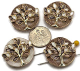 Decorative Tree of Life focal beads featuring intricate bright gold metalwork and earthy enamel leaves in brown, topaz, and ivory colors. These beautiful round 2 Hole Slider Beads include coordinating brown and pearly ivory textured backgrounds for versatile jewelry making designs. Perfect for bracelet making, necklace designs, handmade jewelry sets, and nature-inspired accessories. Wonderful jewelry findings for boutique collections, thoughtful gifts, autumn jewelry, and beading projects.