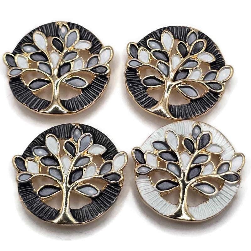 Beautiful Tree of Life 2 Hole Slider Beads featuring rich chocolate brown, warm taupe, soft beige, and ivory enamel leaves with bright reflective gold branches. These round jewelry focal beads feature complementary dark brown and pearly ivory circular backgrounds with decorative textured detailing. Perfect for handmade bracelet designs, necklace making, bead weaving, and multi-strand jewelry projects. Unique jewelry making supplies for beginners and experienced jewelry designers.