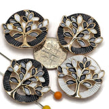 Beautiful Tree of Life 2 Hole Slider Beads featuring delicate enamel leaves in rich chocolate brown, warm taupe, soft beige, and ivory shades. Bright reflective gold branches create an elegant contrast against the dark brown and pearly ivory circular backgrounds. These decorative focal beads are excellent jewelry making components for handmade bracelets, necklace designs, bead weaving, and inspirational jewelry. =