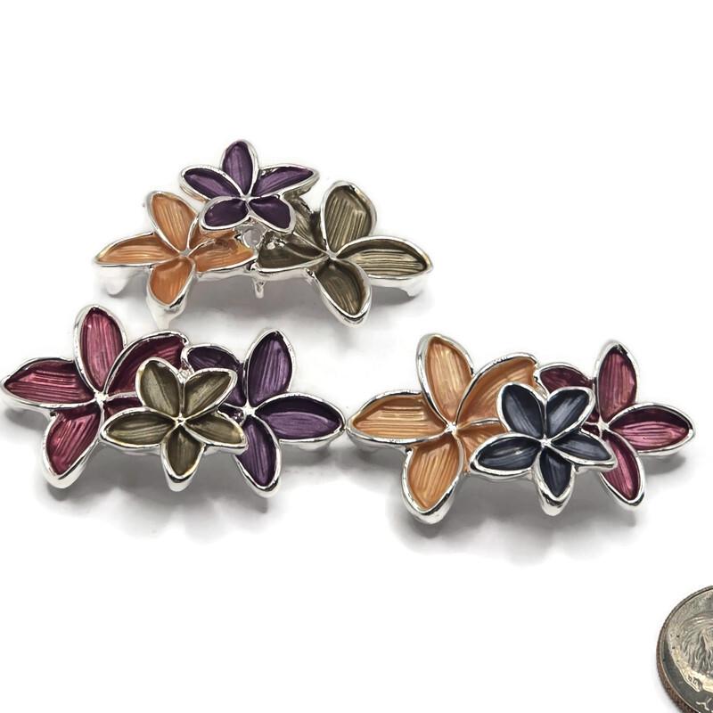 Beautiful dimensional flower focal bead showcasing warm peach, deep wine burgundy, and smoky charcoal gray enamel with reflective bright silver metalwork. Three overlapping five-petal flowers create a decorative botanical arrangement with textured petals and polished silver outlines. These unique 2 Hole Slider Beads add sophisticated color and floral detail to handmade bracelets, necklaces, bead-woven cuffs, and multi-strand jewelry.