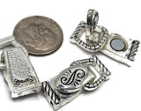Silver foldover magnetic clasp with engraved lid and hammered texture. Features a recessed channel for knots or crimps and dual holes on each side for double‑strand stringing. Ideal for bracelet clasps, necklace clasps, peyote bands, and loom work. Premium jewelry making component for magnetic clasps searches.