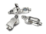 Bright silver magnetic jewelry clasps, foldover locking closure. Loops on each end face opposite ways, enabling single strand or multi strand attachments. Ideal bracelet clasps and necklace clasps for bead weaving and stringing. Keyword set: magnetic bracelet clasps, bracelet clasps, magnetic necklace clasps, magnetic clasps for DIY jewelry.