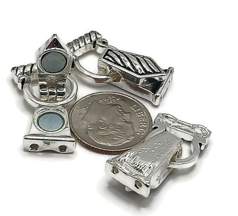 Silver fold over magnetic clasps with true double‑strand design. Each end has 2 holes for parallel beading wire or chain, plus rear cutouts to hide knots or crimp tubes. Click‑to‑lock lid adds security over basic magnets. Ideal magnetic bracelet clasps and magnetic necklace clasps for stringing, bead weaving, and leather. Low‑profile, snag‑resistant finish for everyday jewelry making and repairs.