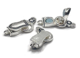 Silver magnetic jewelry clasps, fold over locking style, loops at each end facing opposite ways. Perfect bracelet clasps and magnetic bracelet clasps for multi strand beading projects or single strand stringing. Use as necklace clasps for lightweight gemstone or seed bead designs. Secure, easy magnetic clasp for bracelets and necklaces in DIY jewelry making.