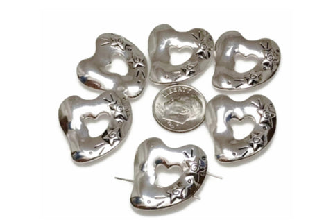 2 hole slider beads in a heart design